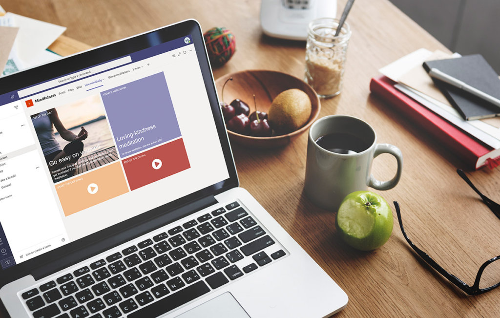 laptop with remote employee wellness teams screenshot