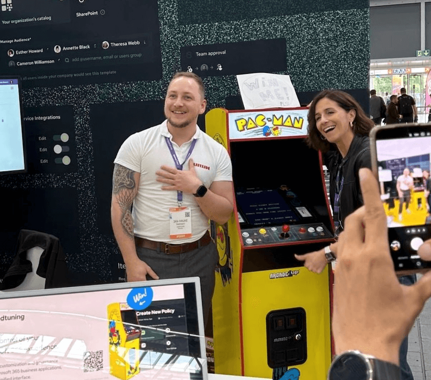 Winner of the pacman machine raffle receiving the prize